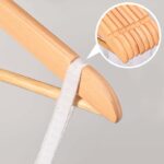 wooden clothes hangers with natural lacquer finish close-up view